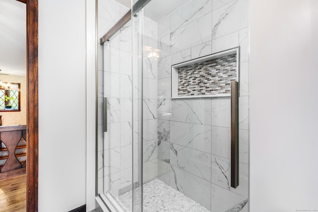 bathroom featuring a stall shower