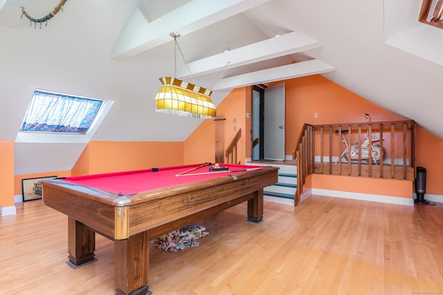 recreation room featuring pool table, lofted ceiling with beams, light wood-type flooring, and baseboards