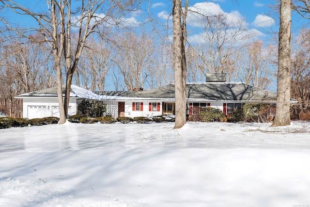 ranch-style house featuring an attached garage