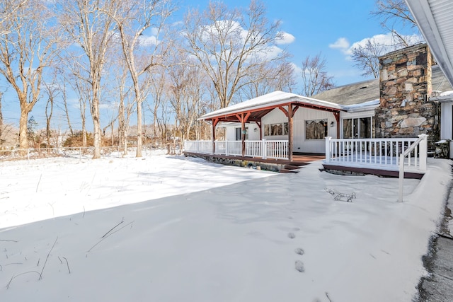 exterior space with a deck and a gazebo