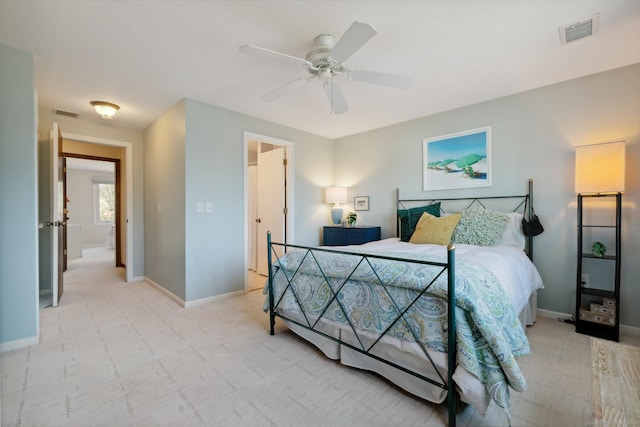 bedroom featuring a ceiling fan, baseboards, and visible vents