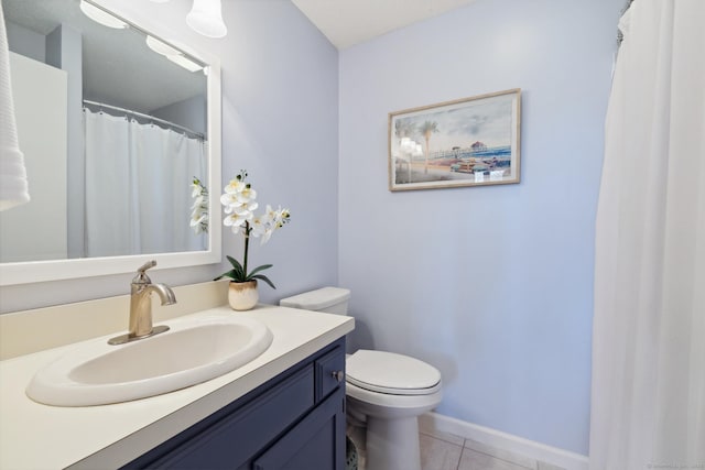 full bathroom featuring tile patterned floors, baseboards, toilet, and vanity