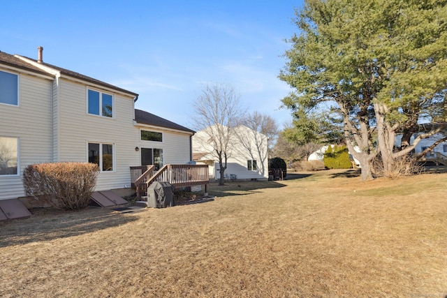 view of yard with a deck