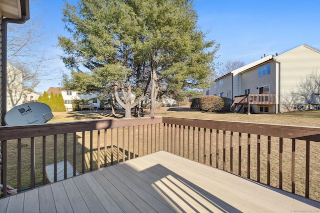 wooden deck with a residential view