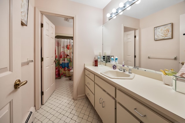 7 Canterbury Ln, Monroe, CT 06468 - full bath featuring vanity, tile patterned floors, and baseboard heating