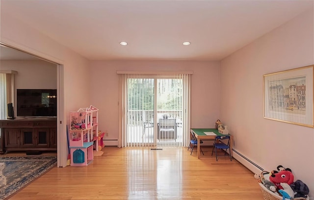 7 Canterbury Ln, Monroe, CT 06468 - rec room with light wood-type flooring, recessed lighting, and baseboard heating