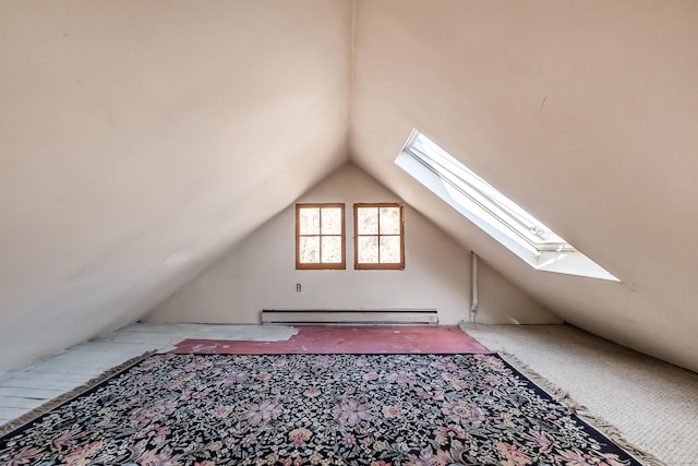 bonus room with lofted ceiling and baseboard heating