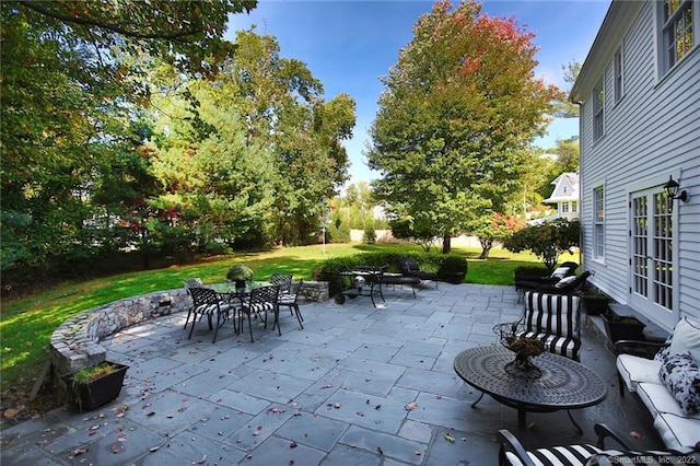 view of patio with outdoor dining area