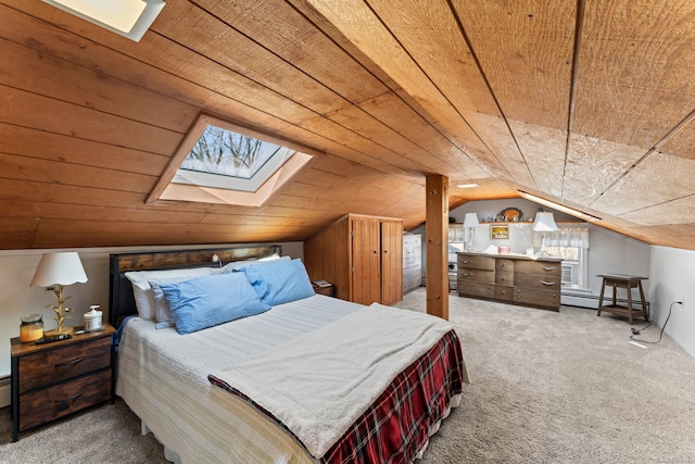 carpeted bedroom with a baseboard heating unit, vaulted ceiling with skylight, and wooden ceiling