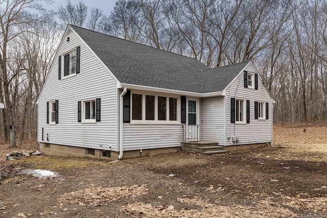 view of front of property with a shingled roof