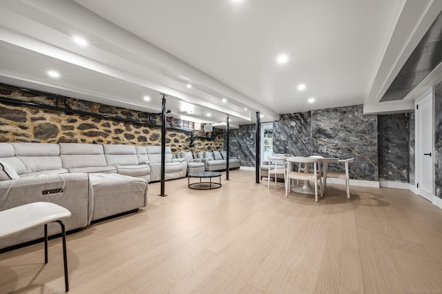 living room featuring wallpapered walls, baseboards, wood finished floors, and recessed lighting