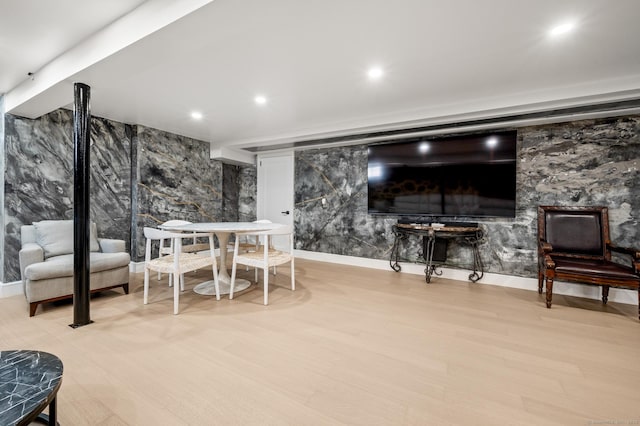 dining room featuring light wood-type flooring and recessed lighting