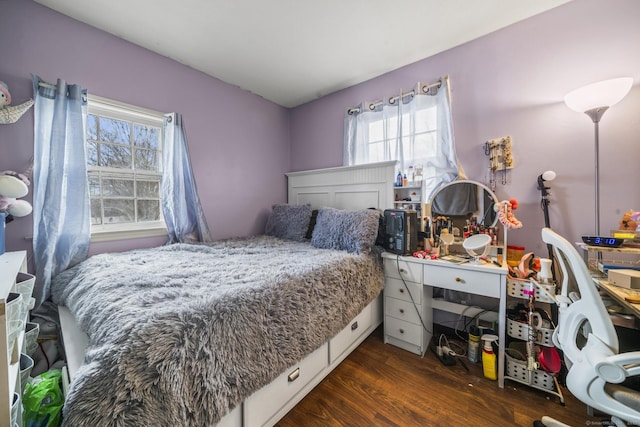 bedroom featuring wood finished floors