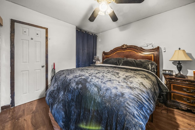 bedroom with ceiling fan and wood finished floors