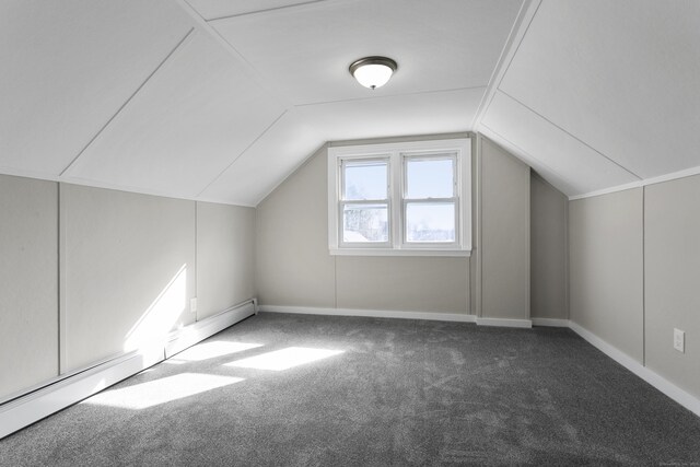 bonus room with a baseboard heating unit, carpet flooring, vaulted ceiling, and baseboards