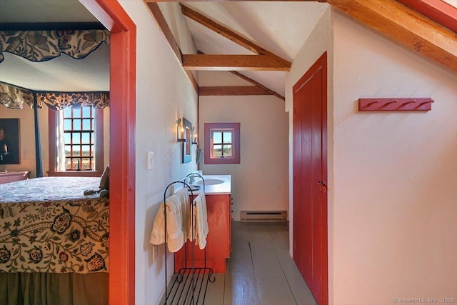 hall featuring vaulted ceiling with beams, a baseboard heating unit, and dark wood-style flooring