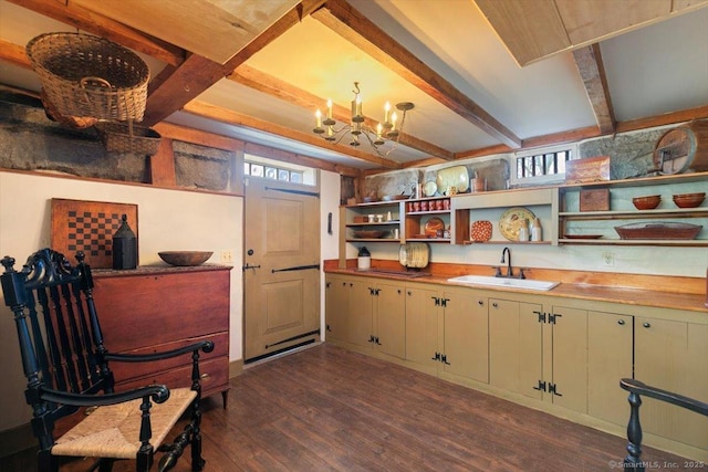 interior space featuring beam ceiling, dark wood-type flooring, and a chandelier