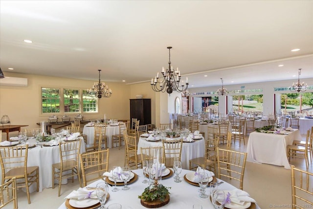 dining room with recessed lighting, a wall mounted air conditioner, and a chandelier