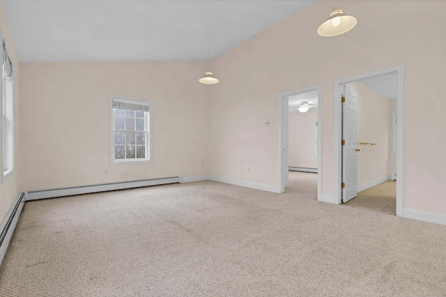 carpeted empty room featuring baseboards, a baseboard heating unit, and lofted ceiling