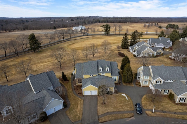 birds eye view of property featuring a residential view and a rural view