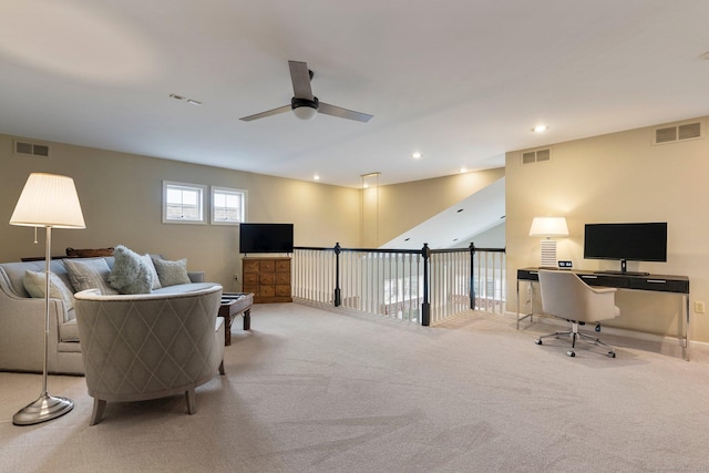 carpeted living room featuring a ceiling fan, visible vents, and recessed lighting