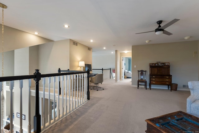 hallway featuring visible vents, carpet flooring, and recessed lighting