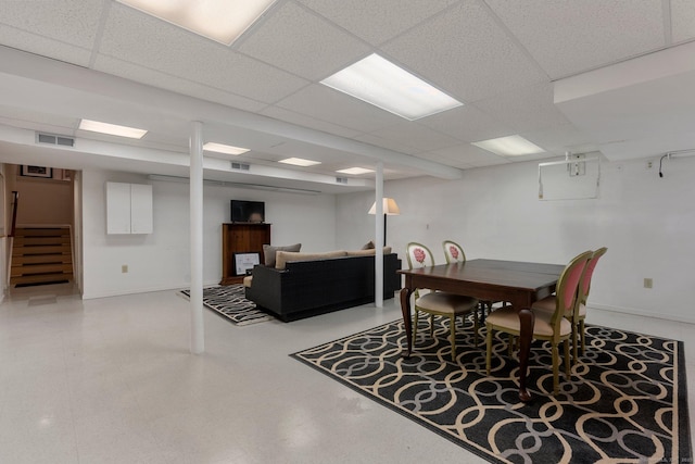 dining area featuring stairs, a drop ceiling, visible vents, and baseboards