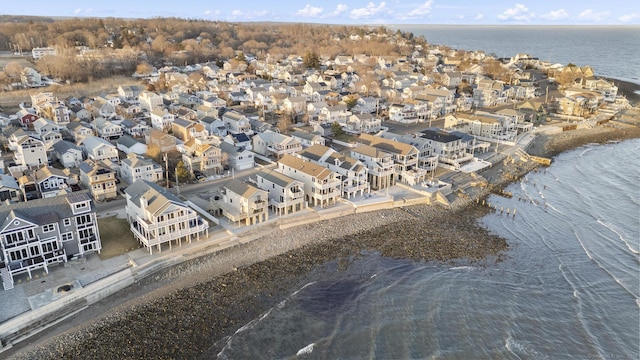 birds eye view of property with a residential view and a water view