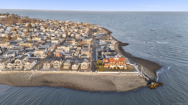 drone / aerial view with a residential view and a water view