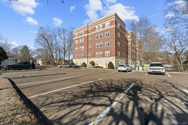 view of property with uncovered parking