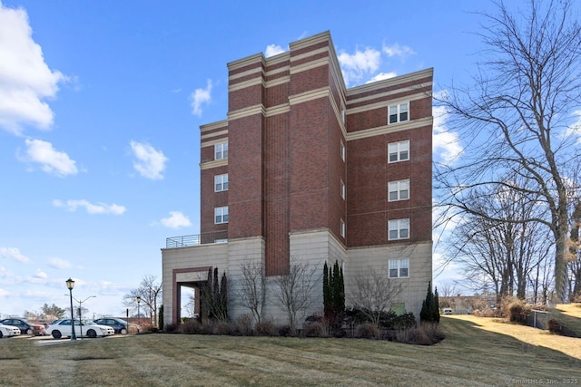 view of property with uncovered parking