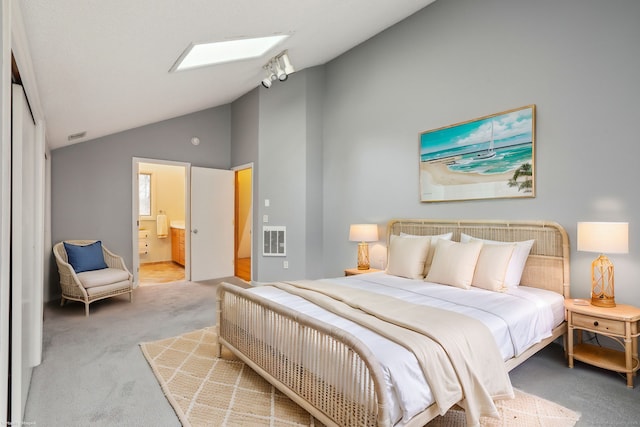 carpeted bedroom with high vaulted ceiling, connected bathroom, and visible vents