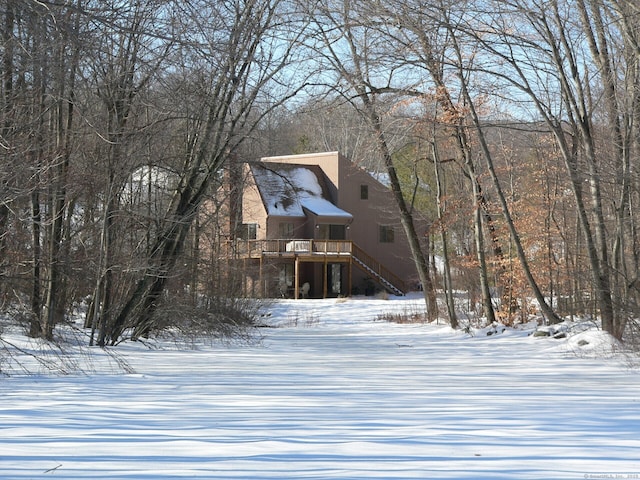 view of front of house featuring stairway