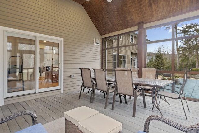 sunroom featuring vaulted ceiling, wooden ceiling, and plenty of natural light