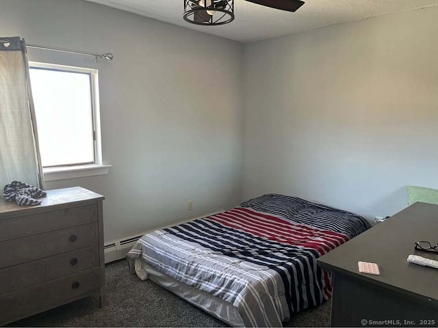 bedroom featuring carpet floors and baseboard heating