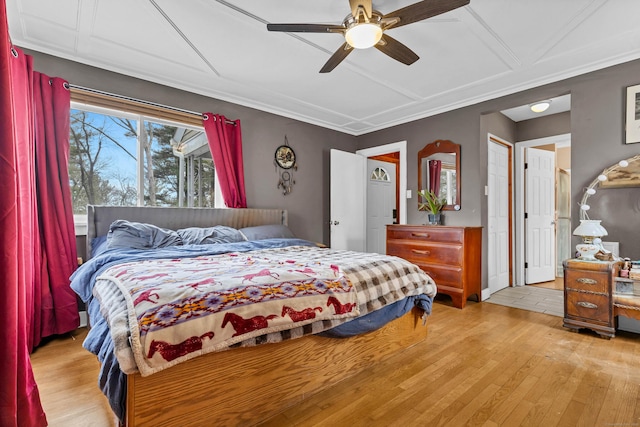 bedroom featuring light wood-style floors and a ceiling fan