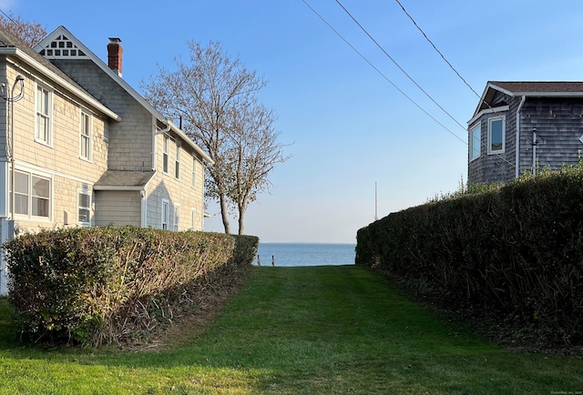 view of yard with a water view