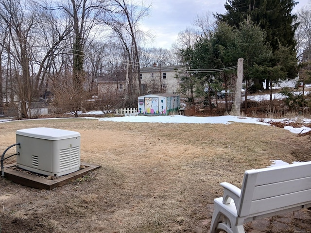 view of yard covered in snow