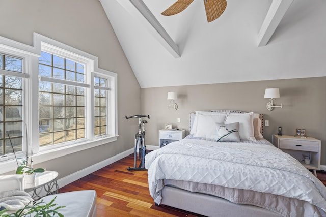 bedroom featuring ceiling fan, baseboards, wood finished floors, and vaulted ceiling