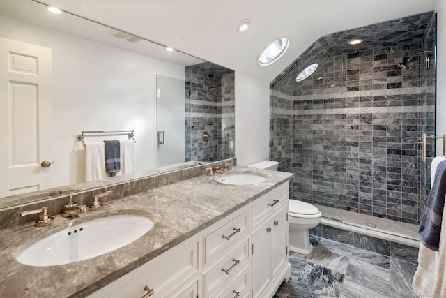 full bath featuring toilet, a shower stall, visible vents, and a sink