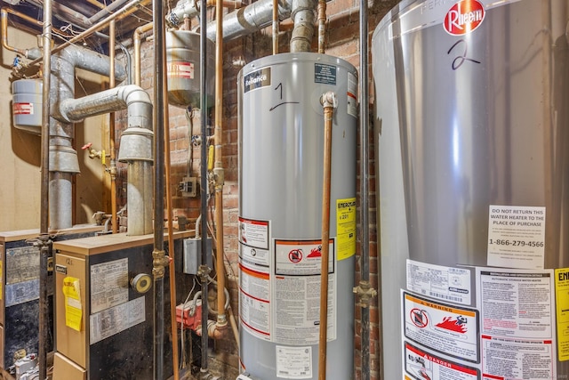 utility room featuring water heater