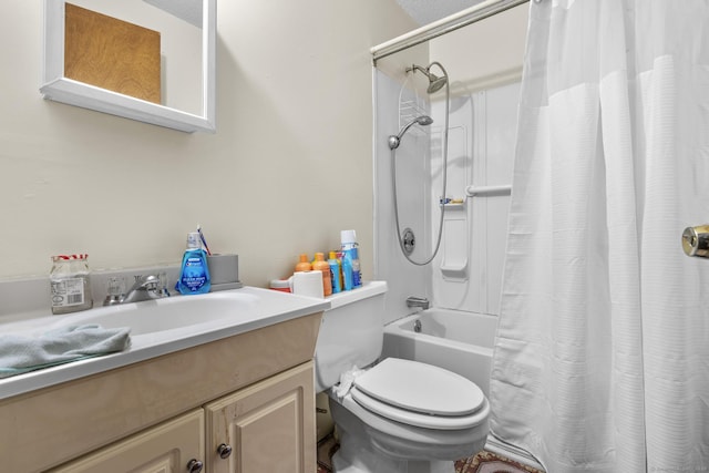 bathroom with shower / bath combo, vanity, and toilet