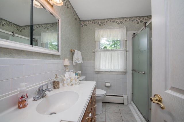 full bathroom with a baseboard heating unit, a shower stall, vanity, tile patterned flooring, and wallpapered walls