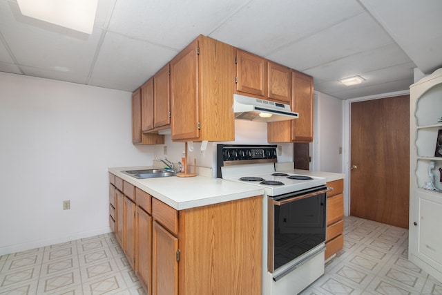 kitchen with light floors, white electric stove, under cabinet range hood, and a sink