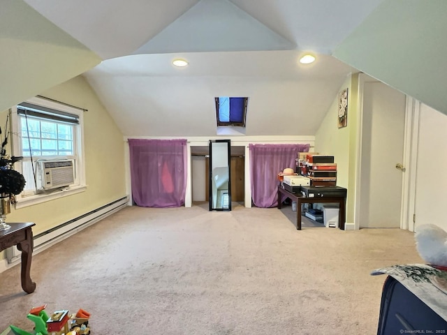 additional living space with cooling unit, light carpet, vaulted ceiling, and baseboard heating