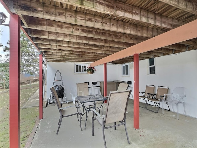 view of patio featuring outdoor dining area