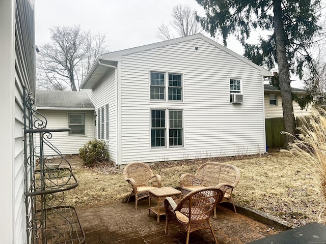 view of property exterior with a patio area and cooling unit