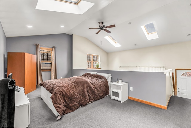 bedroom with lofted ceiling with skylight, a ceiling fan, carpet flooring, and recessed lighting