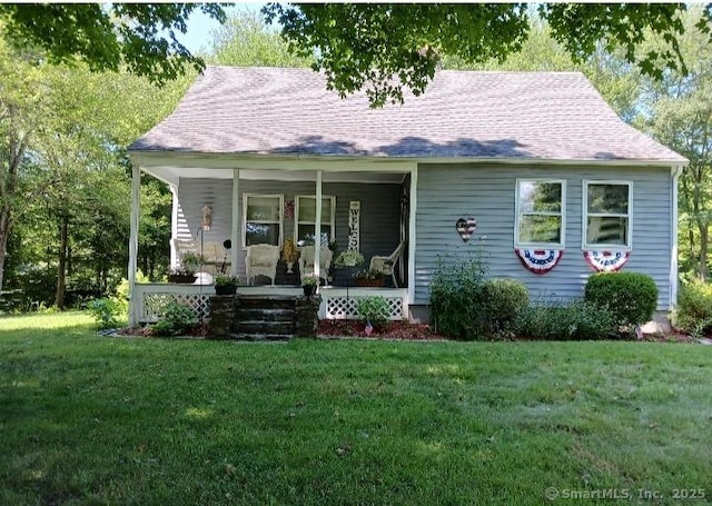 153 Bozrah St, Bozrah, CT 06334 - view of front of home with covered porch and a front yard