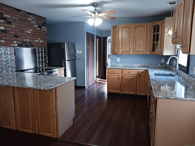 153 Bozrah St, Bozrah, CT 06334 - kitchen with light stone countertops, dark wood-style floors, glass insert cabinets, and a ceiling fan